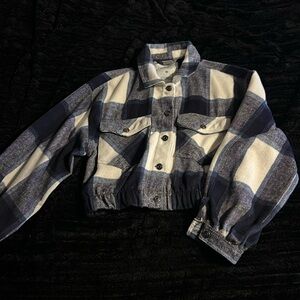 I am selling a size medium Quarry mid-length blue and beige plaid winter jacket.